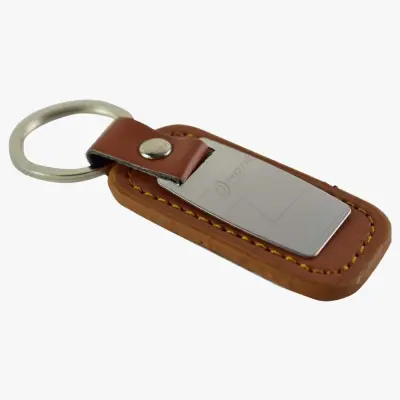 .breloc realizat din inox si piele artificiala - se poate personaliza